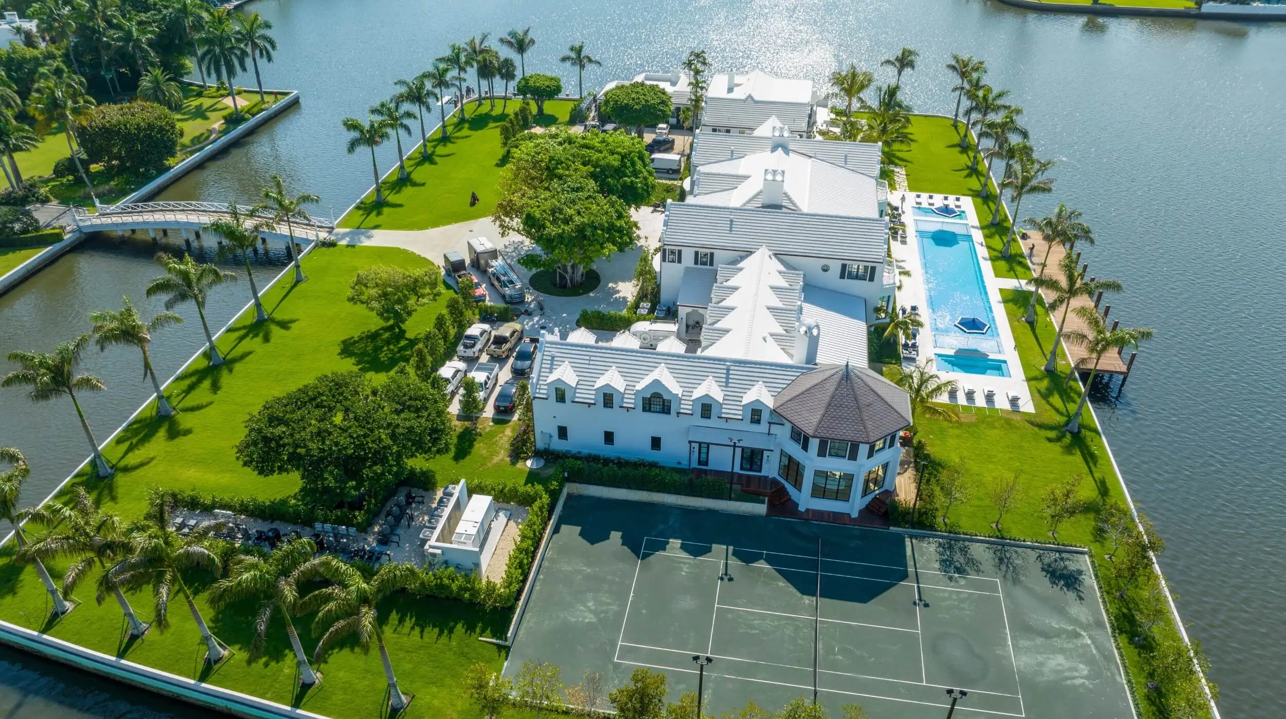 Aerial view of a sprawling luxury waterfront estate in Palm Beach, representing Private Chefs Inc.’s exclusive residential placement services in South Florida.