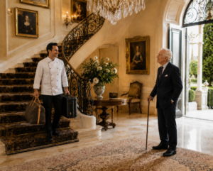 Private Chef assistin an Elderly billionaire client with his luggage at a Private Luxury Estate