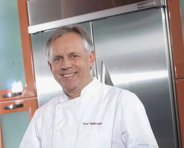 Private chef preparing a salad in a modern kitchen