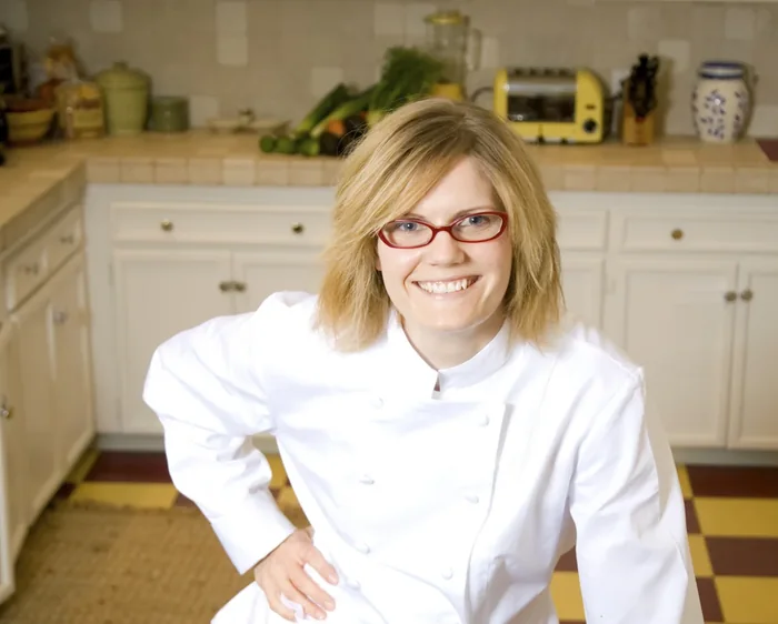 Private chef in a home kitchen with fresh seasonal produce