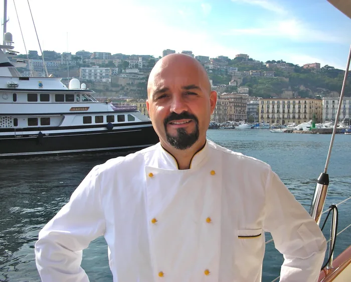 Private chef on a yacht in a harbor