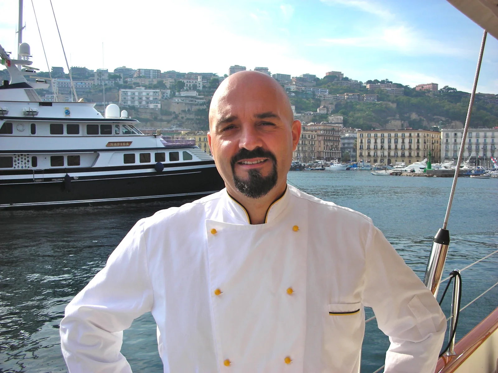 Private chef on a yacht in a harbor
