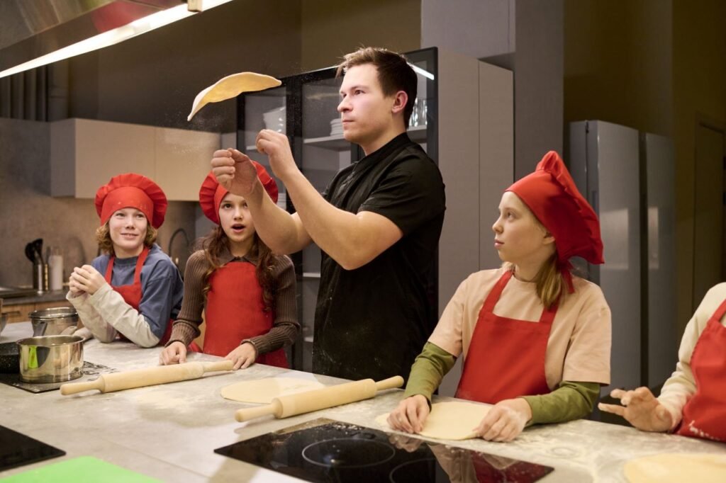 Private Chef Teaching kids how to make pizza in a private Estate