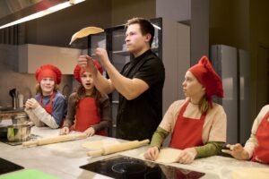 Private Chef Teaching kids how to make pizza in a private Estate