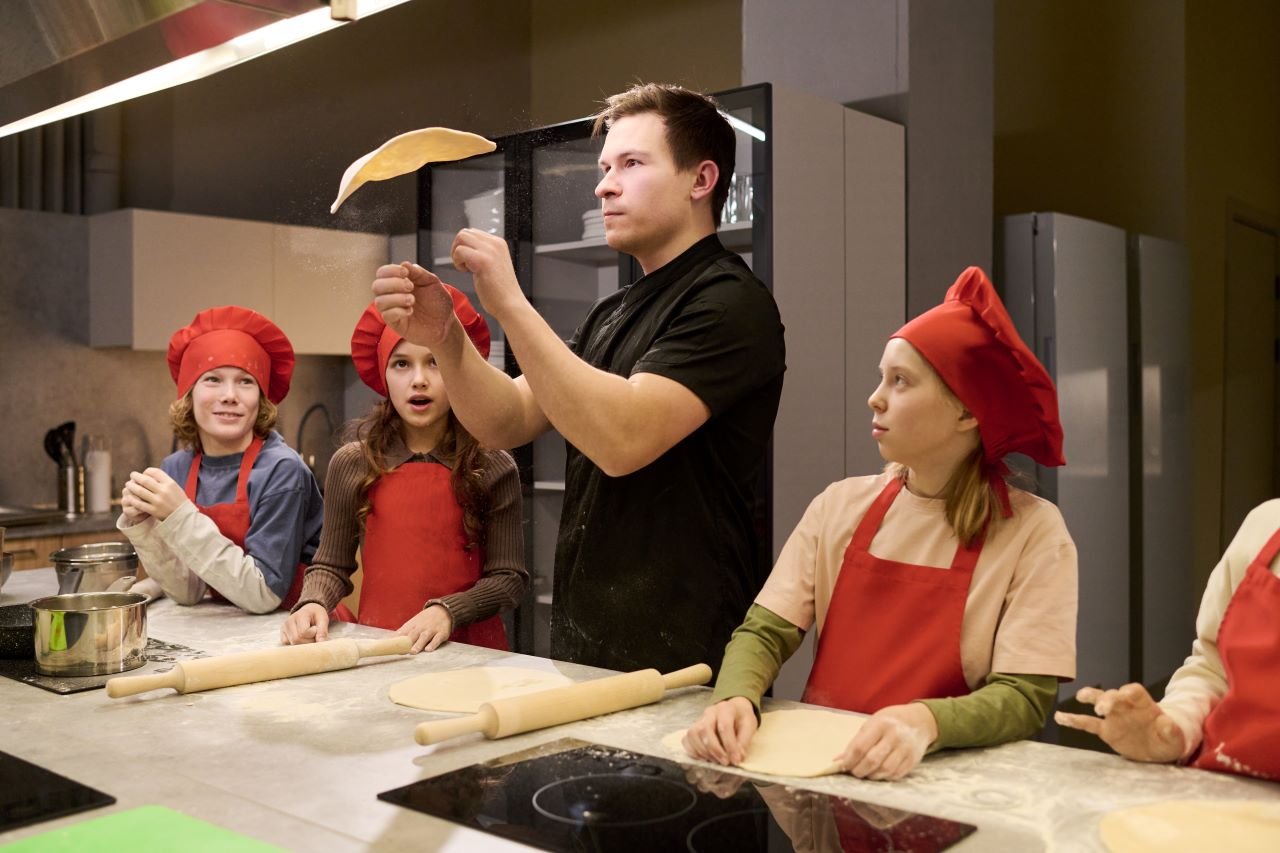Private Chef Teaching kids how to make pizza in a private Estate