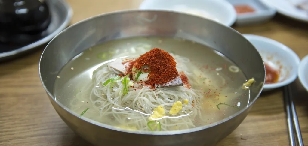 Korean cold noodles with traditional side dishes